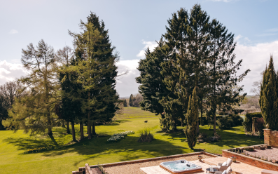 garden view with hot tub